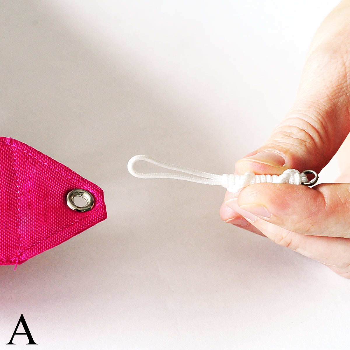 Coiled non-abrasive cord